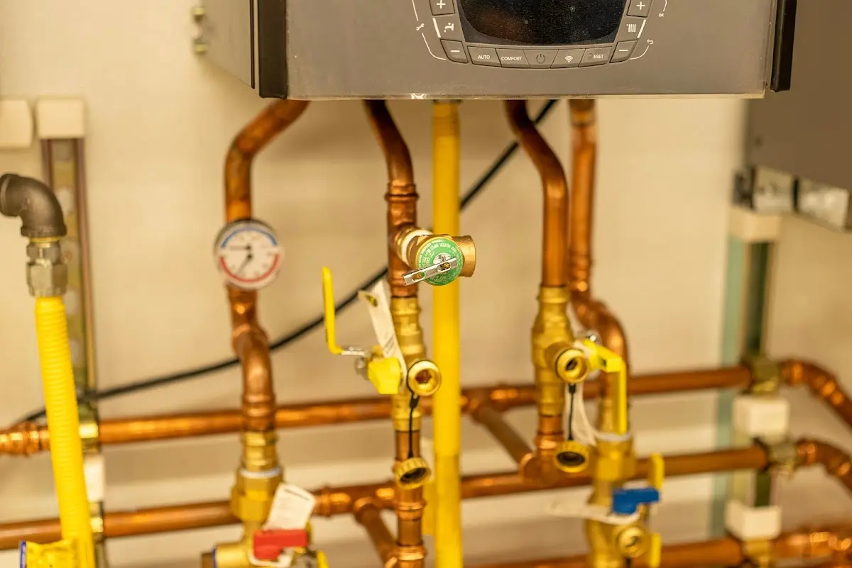 Licensed technician providing Water Heater Installation for a homeowner in Dumont